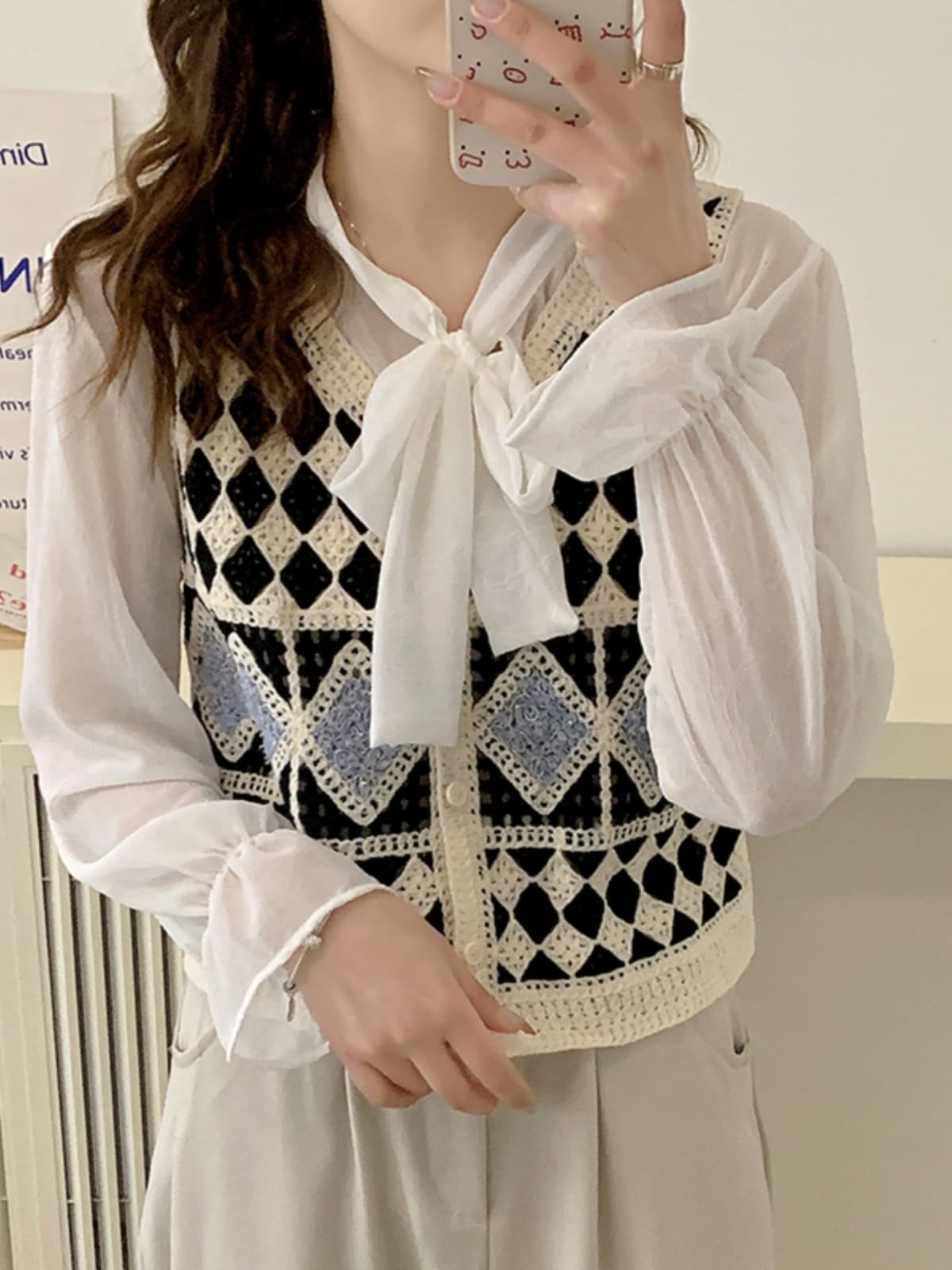 ニットベス 菱形模様のかぎ針編みベスト