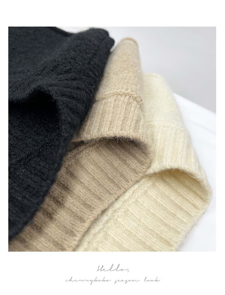 ニットベスト 前後差のある裾デザインリブニット